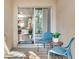 Relaxing patio with outdoor seating offering a view of the interior living space at 30340 Elderwood Dr, Wesley Chapel, FL 33543