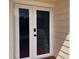 Close-up of the front door with secure digital lock at 3301 Clydesdale Dr, Holiday, FL 34691