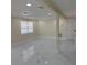 Spacious living room with recessed lighting and marble flooring at 3301 Clydesdale Dr, Holiday, FL 34691