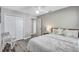 Bedroom featuring white walls, wood-look floors, and an open doorway to the hall at 406 S Melville Ave # 1, Tampa, FL 33606