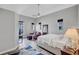 Bright bedroom with sitting area and ample natural light at 406 S Melville Ave # 1, Tampa, FL 33606