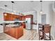 Modern kitchen with granite countertops, stainless steel appliances, and island at 406 S Melville Ave # 1, Tampa, FL 33606