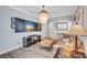 Comfortable living room with stylish furnishings, a unique chandelier, and modern decor at 406 S Melville Ave # 1, Tampa, FL 33606