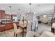 Open living space with a dining area, kitchen island, and comfortable seating, great for entertaining at 406 S Melville Ave # 1, Tampa, FL 33606