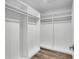 Spacious walk-in closet with custom shelving and ample storage space at 455 Pinellas Bayway S # 2A, Tierra Verde, FL 33715