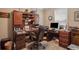 This cozy office features an executive desk and chair, with built-in shelving and ample workspace at 4851 W Gandy Blvd # B09L23, Tampa, FL 33611