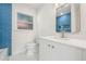 This bright bathroom features a white vanity with a vessel sink at 504 N Habana Ave, Tampa, FL 33609