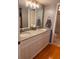 Stylish bathroom features double sinks, granite countertops, and modern fixtures at 5557 Sea Forest Dr # 216, New Port Richey, FL 34652