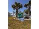 Community lawn with private beach chair at 5557 Sea Forest Dr # 216, New Port Richey, FL 34652