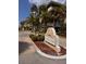 Heather Cove condo complex sign with palm trees lining the entrance at 5557 Sea Forest Dr # 216, New Port Richey, FL 34652