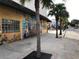 Street view with beautiful murals on the sides of buildings at 5557 Sea Forest Dr # 216, New Port Richey, FL 34652