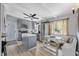 Charming kitchen with stainless steel appliances, modern gray cabinets, and a cozy breakfast nook at 5805 S Hubert Ave, Tampa, FL 33616
