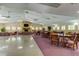 Spacious clubhouse area with fireplace, tables and seating for residents at 612 Fairmont Ave # D, Safety Harbor, FL 34695