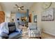 Charming dining area features a hutch, neutral decor, and an open pass-through to the kitchen, enhancing connectivity at 612 Fairmont Ave # D, Safety Harbor, FL 34695