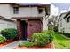 Charming two-story home with brick accents and well-maintained landscaping around the front entrance at 612 Fairmont Ave # D, Safety Harbor, FL 34695