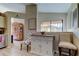 Bright eat-in kitchen featuring modern island seating at 612 Fairmont Ave # D, Safety Harbor, FL 34695