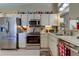 Kitchen features stainless steel appliances, ample cabinet space, and a sleek design at 612 Fairmont Ave # D, Safety Harbor, FL 34695