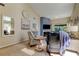 Sunlit living room with fireplace, stylish decor, and comfortable seating arrangement at 612 Fairmont Ave # D, Safety Harbor, FL 34695