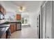 Functional kitchen with good lighting and tile floor, appliances, and a window with a view at 6191 Bahia Del Mar Blvd # 204, St Petersburg, FL 33715