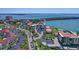 Expansive aerial view featuring the property's location amidst lush landscaping, waterfront, and nearby urban amenities at 6361 Bahia Del Mar Blvd # 205, St Petersburg, FL 33715
