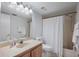 Bathroom with a vanity, white fixtures, and shower-tub combo at 6361 Bahia Del Mar Blvd # 205, St Petersburg, FL 33715