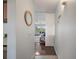 Entryway with wood floors and view into the living room with water views at 6361 Bahia Del Mar Blvd # 205, St Petersburg, FL 33715