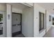 Exterior front door and unit number 204 with covered walkway at 6361 Bahia Del Mar Blvd # 205, St Petersburg, FL 33715