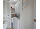 Functional laundry area with a stacked washer and dryer at 6361 Bahia Del Mar Blvd # 205, St Petersburg, FL 33715