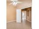 Bedroom with tile floors and an adjacent bathroom at 6711 Thackston Dr, Riverview, FL 33578
