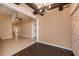 Dining room features exposed beams and wood-look tile flooring at 6711 Thackston Dr, Riverview, FL 33578