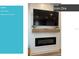 Modern fireplace with ship lap trim, featuring Iron Ore paint and floating shelf at 865 53Rd Ave N, St Petersburg, FL 33703