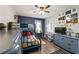 Charming bedroom with bunk beds, a desk, a dresser, and colorful decor at 10101 Mangrove Well Rd, Ruskin, FL 33573