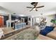 Large open living area, connecting the kitchen and dining room, perfect for entertaining at 10101 Mangrove Well Rd, Ruskin, FL 33573