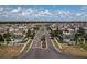 Scenic street view of the residential community featuring manicured landscaping and well-maintained homes at 10101 Mangrove Well Rd, Ruskin, FL 33573