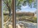 View of the spacious backyard with a privacy fence and mature trees at 16039 Frost Dr, Hudson, FL 34667