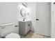 This updated bathroom features modern fixtures, a vanity, and good lighting at 16039 Frost Dr, Hudson, FL 34667