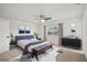 This bedroom features a plush rug, modern furnishings, and calming decor at 16039 Frost Dr, Hudson, FL 34667