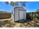 Backyard shed for extra storage with fenced in yard at 16039 Frost Dr, Hudson, FL 34667