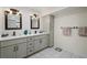 Well-appointed bathroom with double sinks, modern fixtures, and ample storage space, offering a spa-like experience at 1800 Salem Ct, Dunedin, FL 34698
