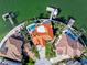 An aerial view showcases luxurious homes with pools, private docks, and waterfront access at 1901 Carolina Ne Ave, St Petersburg, FL 33703