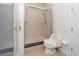 Clean, tiled bathroom features a glass-enclosed shower and modern fixtures at 1901 Carolina Ne Ave, St Petersburg, FL 33703