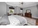Relaxing bedroom with soft gray tones, lots of natural light, and modern furnishings offering a peaceful sanctuary at 1901 Carolina Ne Ave, St Petersburg, FL 33703