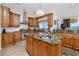 Open kitchen with granite countertops, a center island, and views of the water at 1901 Carolina Ne Ave, St Petersburg, FL 33703