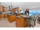 Beautiful kitchen with an island, breakfast bar, granite countertops, and bay views at 1901 Carolina Ne Ave, St Petersburg, FL 33703