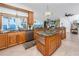 Gourmet kitchen boasting an island, stainless appliances, and views of the bay at 1901 Carolina Ne Ave, St Petersburg, FL 33703