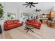 Open living room with bar area and water views, perfect for entertaining at 1901 Carolina Ne Ave, St Petersburg, FL 33703