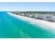Beautiful aerial view of the condo, pristine beach and the gulf coast at 19925 Gulf Blvd # 402, Indian Shores, FL 33785