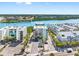 Beautiful aerial view of the condo, intercoastal waterway, and harbor in desirable beach community at 19925 Gulf Blvd # 402, Indian Shores, FL 33785