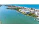 Beautiful aerial view of the condo, intercoastal waterway, and harbor in desirable beach community at 19925 Gulf Blvd # 402, Indian Shores, FL 33785