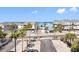 Charming beach community with colorful houses and swaying palm trees at 19925 Gulf Blvd # 402, Indian Shores, FL 33785
